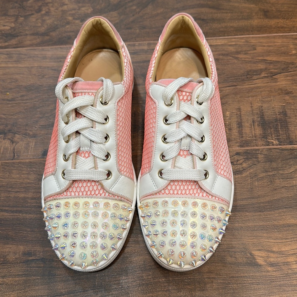 Christian LouBoutin Pink sneaker with spikes. Size (36)